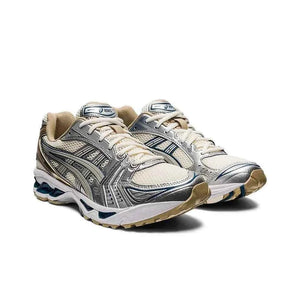 Asics Gel Kayano 14 حذاء ذهبي فضي.