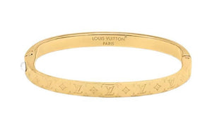 سوار Louis Vuitton ذهبي بنمط Monogram أنيق.