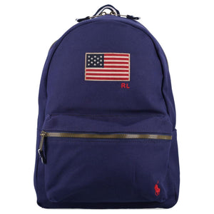 Full front view of an authentic Polo Ralph Lauren navy blue backpack with American flag patch and red pony logo, perfect for back-to-school season.
عرض أمامي كامل لحقيبة ظهر Polo Ralph Lauren باللون الكحلي أصلية مع رقعة العلم الأمريكي وشعار المهر الأحمر، مثالية لموسم العودة للمدرسة.