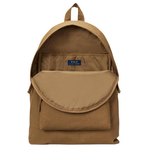 Open interior view of an original Ralph Lauren camel school backpack revealing ample storage space for books and laptop.
عرض داخلي مفتوح لحقيبة ظهر مدرسة رالف لورين أصلية باللون الجملي يوضح مساحة التخزين الوفيرة للكتب والكمبيوتر المحمول.