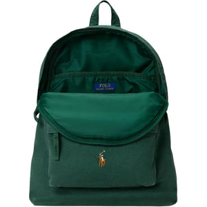 Open interior view of an original Ralph Lauren green school backpack showing main storage compartment and blue interior brand label.
عرض داخلي مفتوح لحقيبة ظهر مدرسة رالف لورين أصلية باللون الأخضر يوضح مساحة التخزين الرئيسية وعلامة الماركة الزرقاء الداخلية.