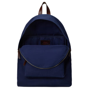 Open interior view of an original Ralph Lauren Polo Bear navy blue school backpack showing spacious storage compartment and interior brand tag.
عرض داخلي مفتوح لحقيبة ظهر مدرسة Ralph Lauren Polo Bear أصلية باللون الكحلي يوضح مساحة التخزين الواسعة وعلامة الماركة الداخلية.