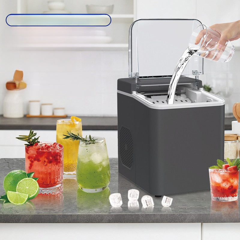 Ice Maker Machine making fresh ice cubes quickly for cold drinks at home or in the office.