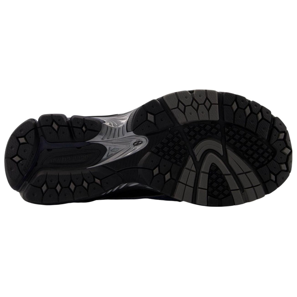 Bottom sole traction pattern of the New Balance 1906L Loafer Black Blue ensuring reliable grip, tailored for شوز نيو بالانس الأصلي.