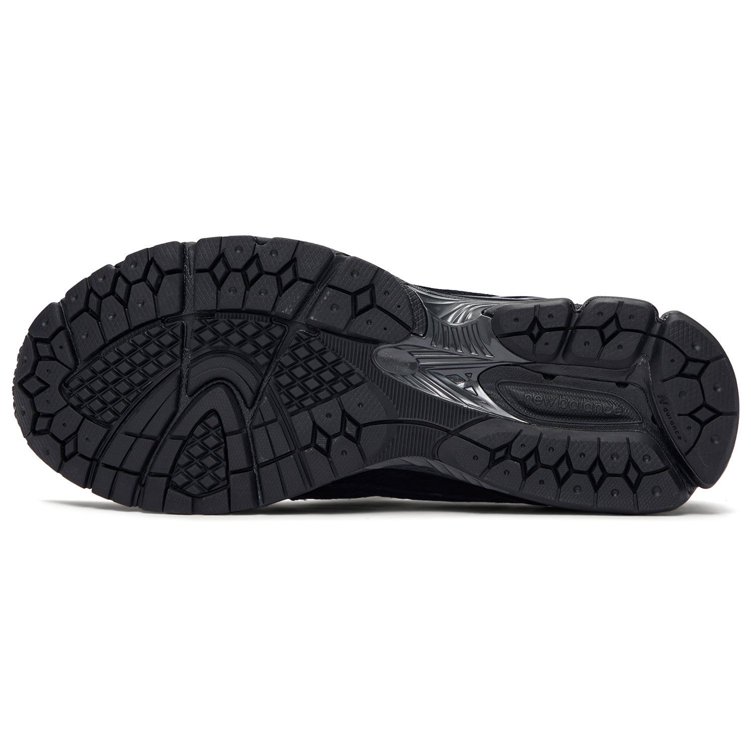 Bottom sole traction pattern of the New Balance 1906L Triple Black for reliable grip.