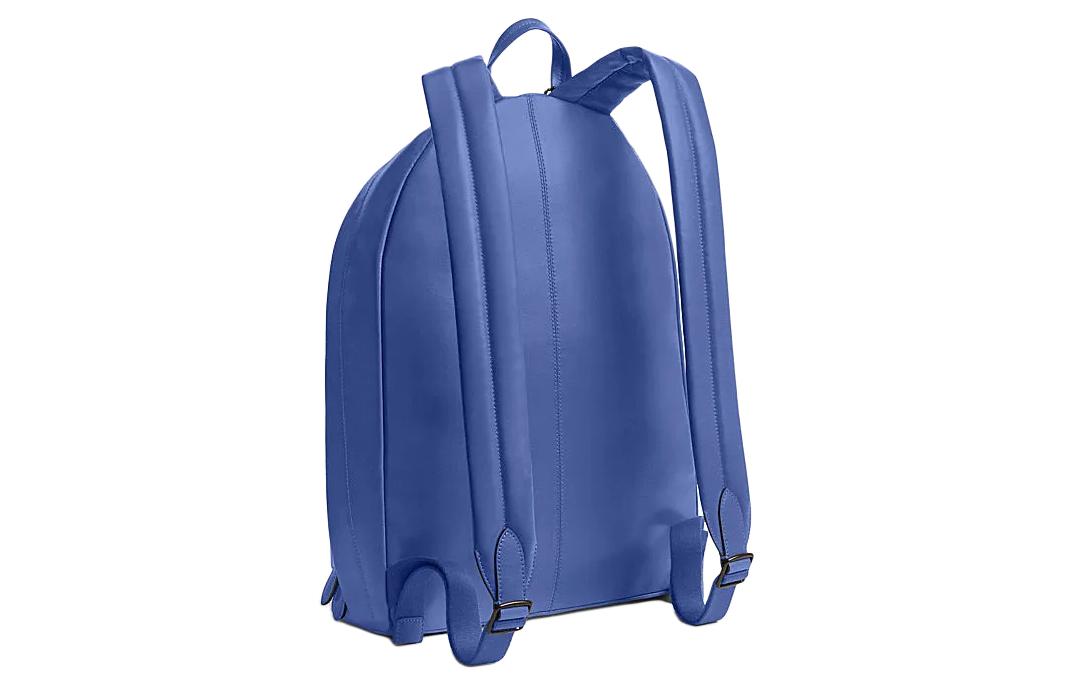 Side angle back view of an original Coach Westway 32 blue leather backpack showing padded adjustable shoulder straps.

عرض زاوي جانبي خلفي لحقيبة ظهر كوتش ويست واي 32 أصلية جلد باللون الأزرق يوضح أحزمة الكتف المبطنة وقابلة للتعديل.