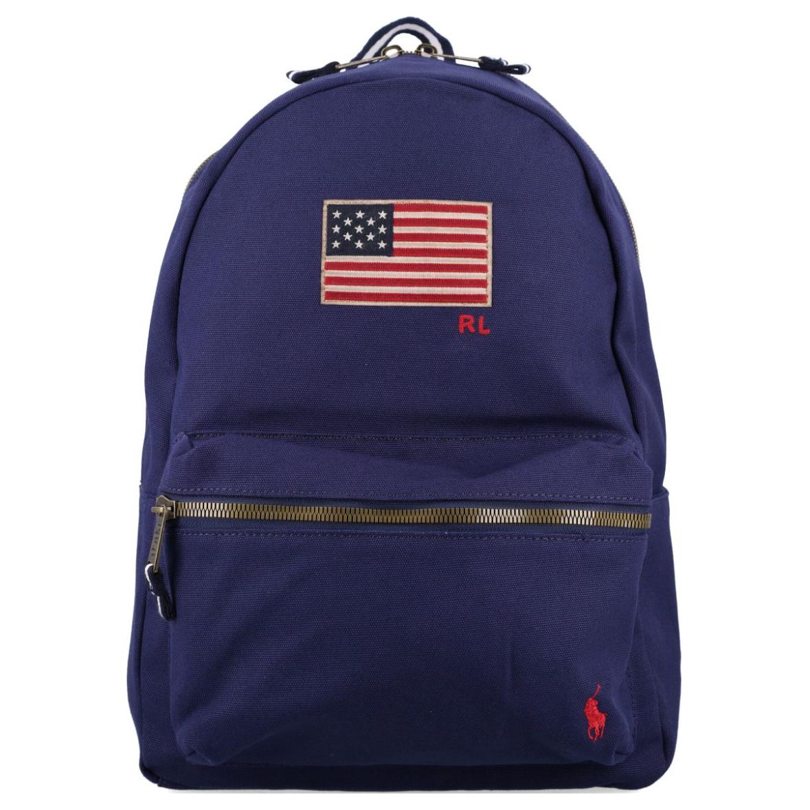 Full front view of an authentic Polo Ralph Lauren navy blue backpack with American flag patch and red pony logo, perfect for back-to-school season.

عرض أمامي كامل لحقيبة ظهر Polo Ralph Lauren باللون الكحلي أصلية مع رقعة العلم الأمريكي وشعار المهر الأحمر، مثالية لموسم العودة للمدرسة.