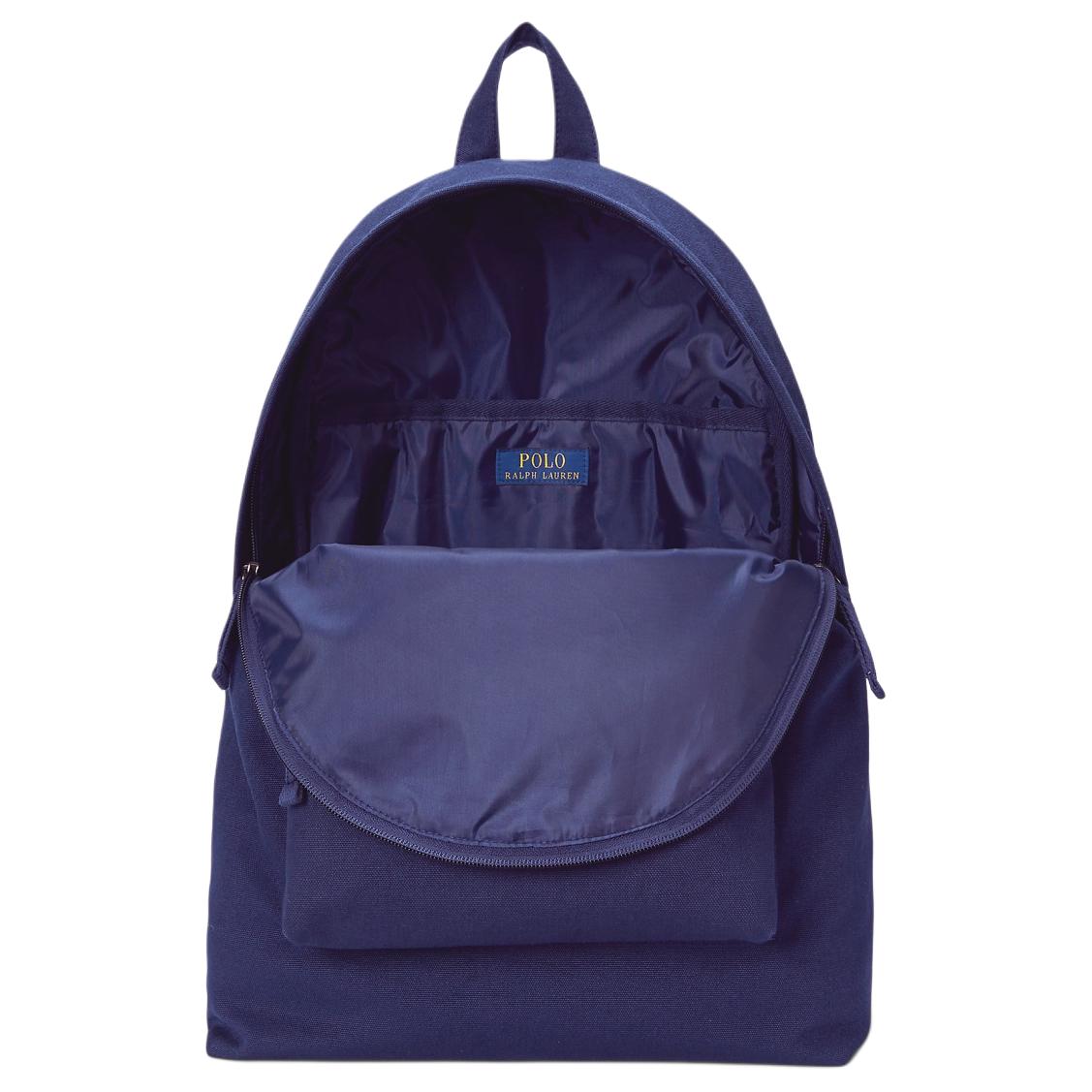 Inside view of an original Ralph Lauren navy backpack showing spacious storage compartments for school and travel essentials.

عرض من الداخل لحقيبة ظهر رالف لورين أصلية كحلي توضح مساحة التخزين الواسعة لمستلزمات المدرسة والسفر.