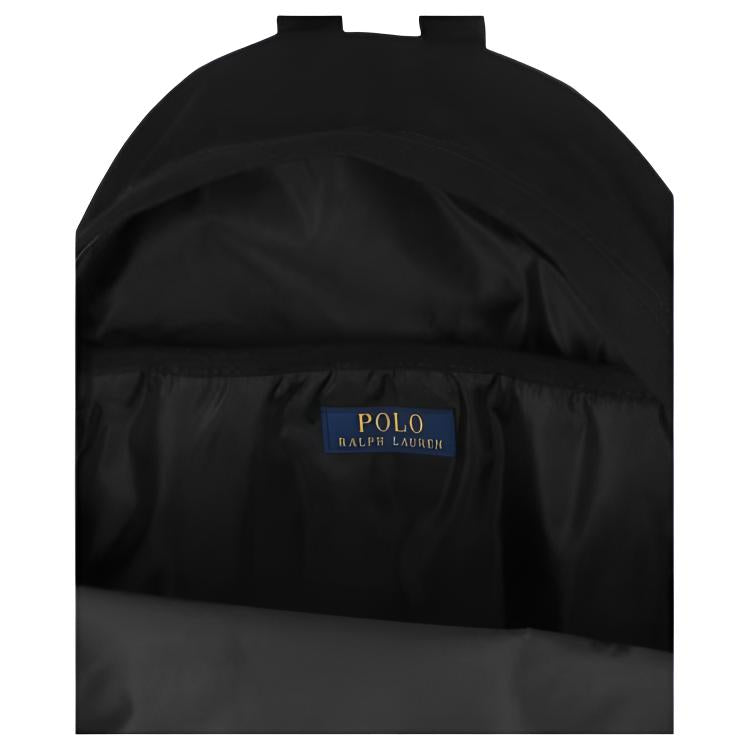 Open interior view of an authentic black Ralph Lauren backpack displaying the interior storage space and brand label.

عرض داخلي مفتوح لحقيبة ظهر رالف لورين أصلية باللون الأسود يوضح مساحة التخزين الداخلية وعلامة الماركة.